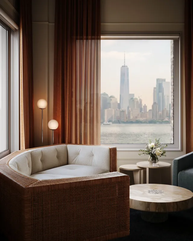 Rattan sofa corner by a window over the Hudson